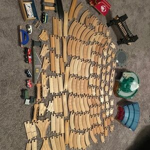 178 wooden train pieces